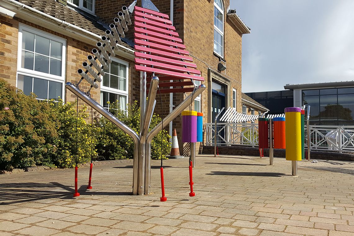 outdoor xylophone installed in special needs school playground
